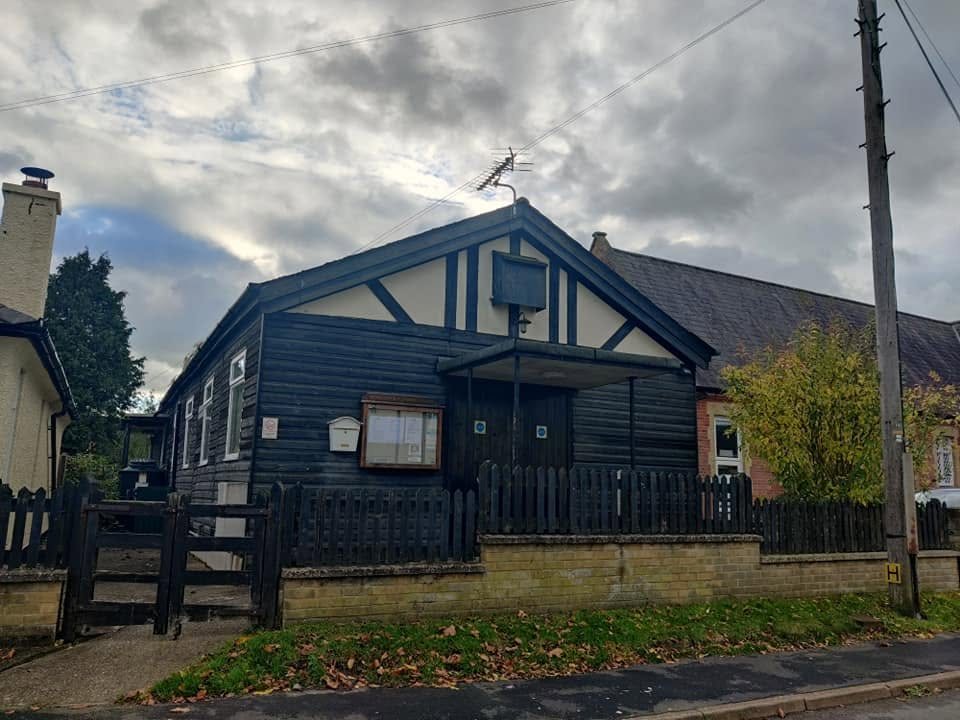 The timber-clad exterior and entrance of Tonwell Village Hall